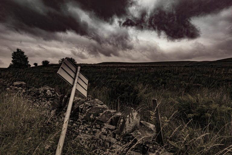 Belmont Road before a rainstorm.  A heavy downfall on its way over the west pennines.  Stormy skies make dramatic pictures.