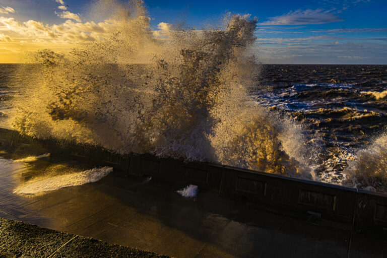 Very high winds and bright sunlight make some very dramatic stormy pictures at high tide in Blackpool.
