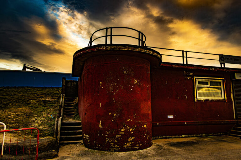 A really murky gloomy evening in Blackpool.   Strong winds blowing the clouds quickly across the stormy sky and the threat of rain.