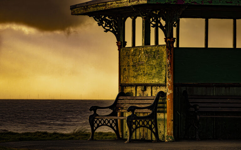 Powerful winds along the beach at Cleveleys.  A fast setting sun has created some eye catching images amongst the sea defences as the tide goes out.